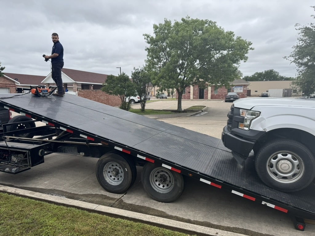 tilt deck trailer with car to haul